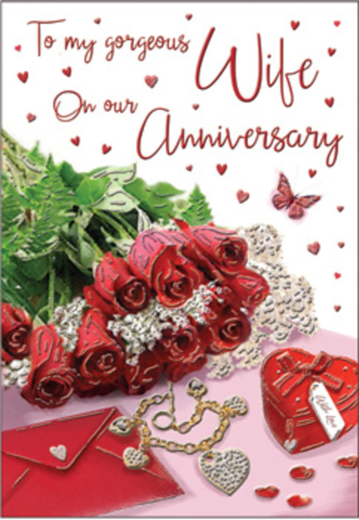 In this richly detailed anniversary card design, the eye is immediately drawn to a classic bouquet of red roses resting proudly at centre stage, as if freshly arranged in a Shepherd's Bush studio just off Goldhawk Road. Each rose is luxuriantly full, its petals layered in deep crimson swirls that create a sense of depth and movement, like small velvet whirlpools of colour. The blooms are gathered with lush greens, their polished leaves and fine stems weaving a natural frame that makes the bouquet appear both abundant and carefully controlled. Around this floral focus lies a thoughtful scattering of romantic elements: a delicate jewellery set that includes a necklace or earrings catching the light with subtle metallic glimmers, and a vivid red gift box with softly rounded edges that seems to promise a treasured keepsake waiting within. Whisper-fine lace details and tiny heart shapes are woven through the background, their gentle curves and intricate patterns adding a note of vintage charm. The scripted message on the card flows in graceful, looping letters, suggesting heartfelt words that might be spoken over dinner in a cosy flat near Ravenscourt Park or after a leisurely walk home from Shepherd's Bush Green. Textures of velvet, gold, silk-like ribbon, and smooth card stock all play against one another, creating a tactile impression even through the image alone. The lighting is warmly diffused, giving everything a soft halo that feels like a lingering embrace, ideal for conveying the quiet yet powerful emotion of an anniversary celebrated with gratitude, shared history, and renewed commitment.